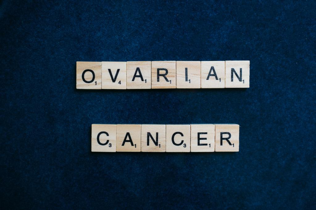 Small wooden blocks aligned to spell "ovarian cancer."